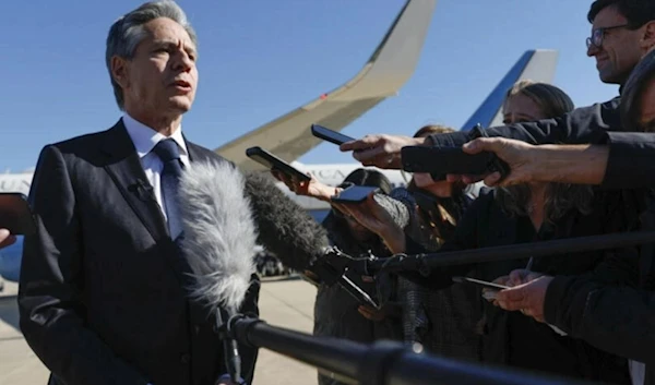 US Secretary of State Antony Blinken talks to reporters prior to boarding his aircraft at Joint Base Andrews on his way to the Middle East and Asia (AFP)