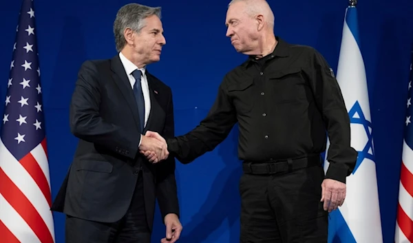 Israeli Security Minister Yoav Gallant, right, and US Secretary of State Antony Blinken shake hands prior to a meeting in "Tel Aviv", Palestine, Thursday, Nov. 30, 2023. (AP)