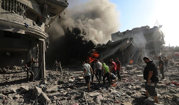 Palestinians inspect the damage of a house destroyed by an Israeli airstrike in Gaza City, Saturday, Nov. 4, 2023 (AP Photo/Abed Khaled)