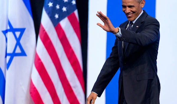 President Barack Obama waves to the audience as he arrives to speak at the International Convention Center in occupied al-Quds, Thursday, March 21, 2013. (AP)