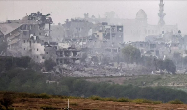 Bombed-out buildings seen inside the Gaza Strip (AFP)