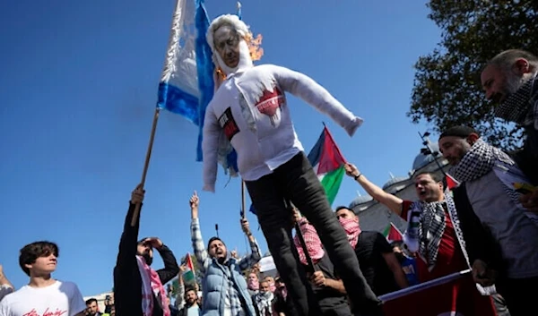 Protesters chant slogans in Istanbul, Turkey, October 20, 2023 (AP)