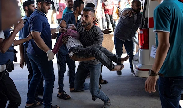 A Palestinian wounded in Israeli bombardment of the Gaza Strip is brought to a hospital in Khan Younis, Monday, Nov. 6, 2023. (AP Photo/Fatima Shbair)