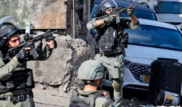 Israeli occupation forces take aim at Palestinians of Wadi Joz in East Al-Quds. (AFP/Getty)