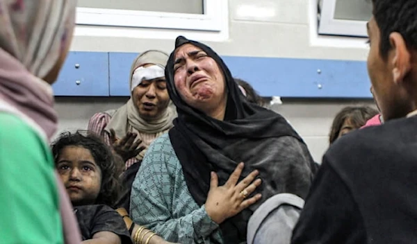 Women and children wounded in Israeli airstrike at al-Ahli Arab hospital, waiting to be treated at the al-Shifa hospital, in Gaza City, on October 17, 2023. (AP)