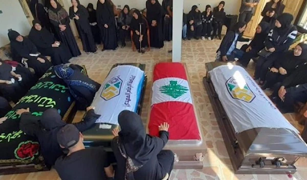 Mourners gathered at the coffins of three sisters killed by an Israeli airstrike on October 7 (Twitter)