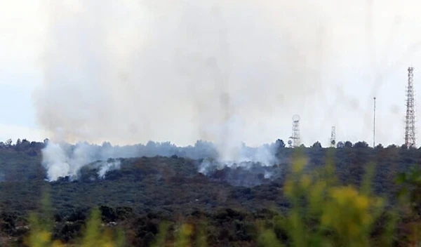 A picture taken from southern Lebanon near the border with occupied Palestine shows a fire that reportedly ignited after shell fire from “Israel” in Alma al-Shaab, on October 30, 2023. (AFP)