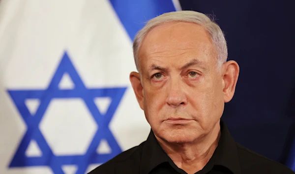 Israeli Prime Minister Benjamin Netanyahu attends a press conference with Defense Minister Yoav Gallant and Cabinet Minister Benny Gantz in the Kirya military base on Oct. 28, 2023 (AP)