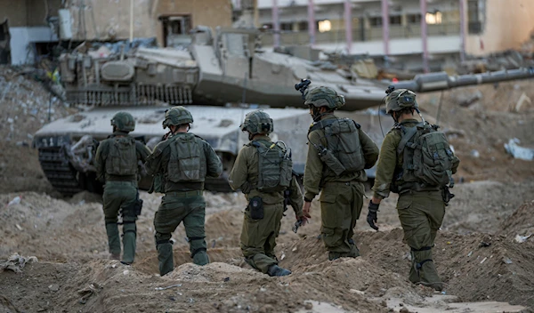 Israeli IOF troops are seen during a ground operation in the Gaza Strip, Wednesday, Nov. 8, 2023. (AP)