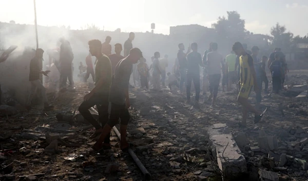 Palestinians inspect the damage of a destroyed mosque following an Israeli airstrike in Khan Younis refugee camp, southern Gaza Strip, Wednesday, Nov. 8, 2023. (AP)