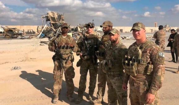 US occupation soldiers stand at Ain al-Assad air base in Anbar, Iraq, Monday, Jan. 13, 2020. (AP)