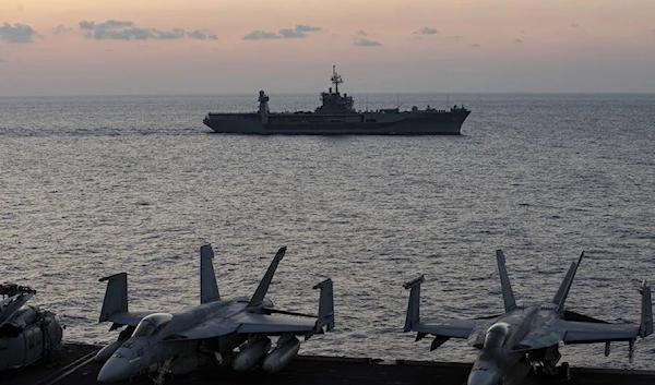 The USS Mount Whitney steams alongside the aircraft carrier USS Gerald R. Ford in the Mediterranean Sea, Oct. 3, 2023. Mount Whitney departed its port in Gaeta