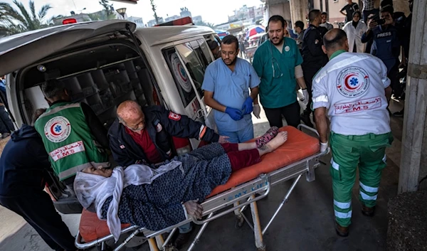 Palestinians wounded in Israeli bombardment of the Gaza Strip are brought to a hospital in Khan Younis, Friday, Dec. 1, 2023. (AP Photo/Fatima Shbair)