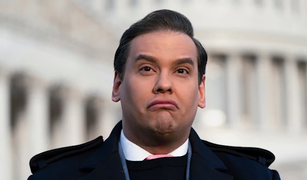 Rep. George Santos, R-N.Y., faces reporters at the Capitol in Washington, early Thursday, Nov. 30, 2023. (AP)