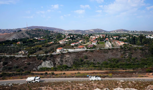 U.N. peacekeepers patrol on the Lebanese side of the Lebanese-Israeli border in the southern village of Kfar Kila, with the Israeli town of Metula in the background, Lebanon, Monday, Oct. 9, 2023. (AP)