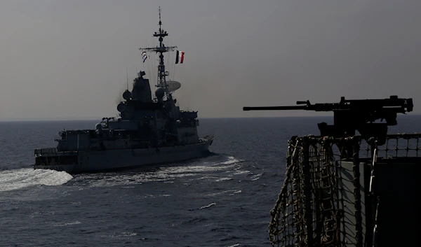 A France war ship, left, passes by the Royal Navy's flagship HMS Albion during naval drills between Britain, France and Cyprus off Limassol, Cyprus, on Tuesday, Oct. 27, 2020. (AP)