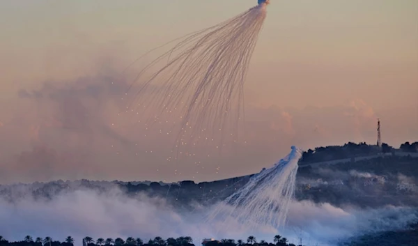 Shells that appears to be white phosphorus from Israeli artillery explode over al-Dhayrah, a Lebanese border village with occupied Palestine, south Lebanon, on October 16, 2023