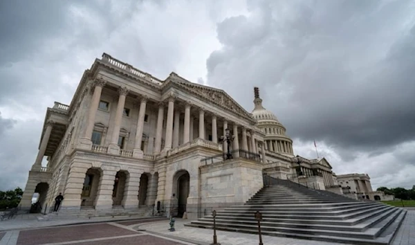 Storm cloud pass over the House of Representatives, foreground side of the US Capitol in Washington, Sunday September 24, 2023. (AP)