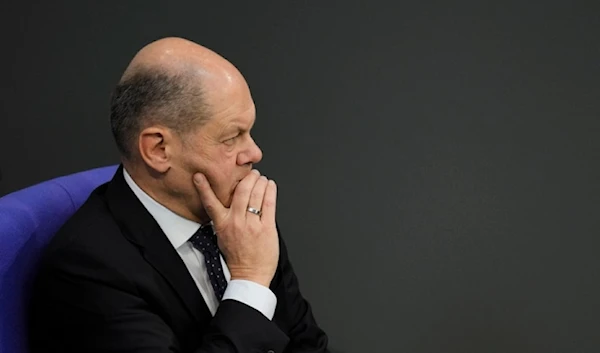 German Chancellor Olaf Scholz attends a debate about Germany's budget crisis at the parliament Bundestag in Berlin, Germany, Tuesday, Nov. 28, 2023. (AP)