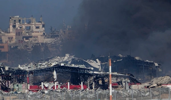 Smoke rises following an Israeli bombardment in the Gaza Strip, as seen from southern occupied Palestine, Saturday, Dec. 16, 2023 (AP Photo)