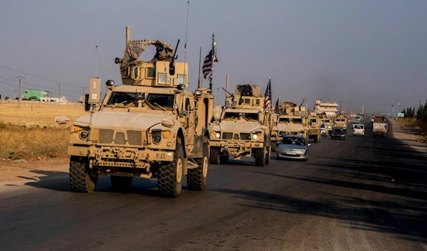 US occupation convoy drives near the town of Qamishli, north Syria, Saturday, Oct. 26. 2019. (AP)