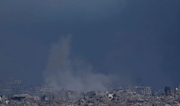 Smoke rises following an Israeli bombardment in the Gaza Strip, Saturday, December 16, 2023 (AP)