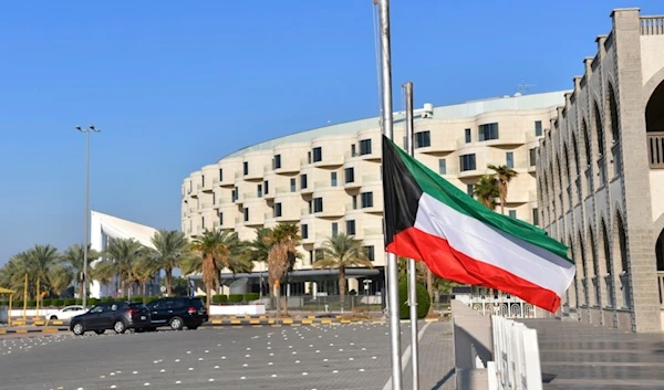 Kuwait national flag is in half mast after the death of the Emir of Kuwait Sheikh Nawaf Al Ahmad Al Sabah, in Kuwait, Saturday, Dec. 16, 2023. (AP)