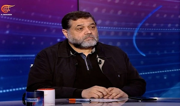 Hamas Politburo member Osama Hamdan speaks to Al Mayadeen on Sunday 18, 2023. (Al Mayadeen)