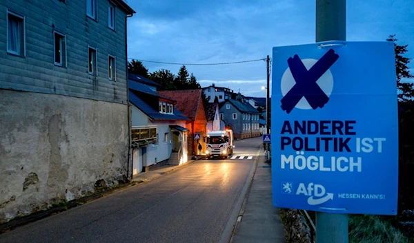 An elections poster of German right wing party AfD is fixed at a pole in Oberreifenberg near Frankfurt, Germany, Monday, Oct. 9, 2023. (AP)