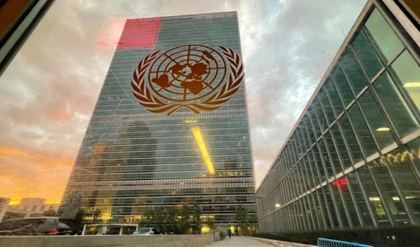 The United Nations headquarters building is seen from inside the General Assembly hall, on Sept. 21, 2021 (AP)