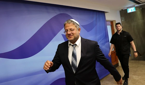 Israel's National Security Minister Itamar Ben-Gvir arrives to attend the weekly cabinet meeting at the prime minister's office in Occupied Palestine, Sunday, July 9, 2023 (AP)