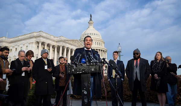 Rep. George Santos, R-N.Y., faces reporters at the Capitol in Washington, early Thursday, Nov. 30, 2023. (AP)