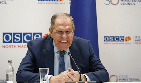 Russia's Foreign Minister Sergey Lavrov is laughing during his news conference at the time of the OSCE meeting in Skopje, North Macedonia, on Friday, Dec. 1, 2023. (AP)