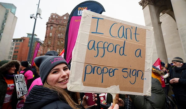 A demonstration in support of strikers is seen in central Manchester, England, Wednesday, Feb. 1, 2023. (AP)