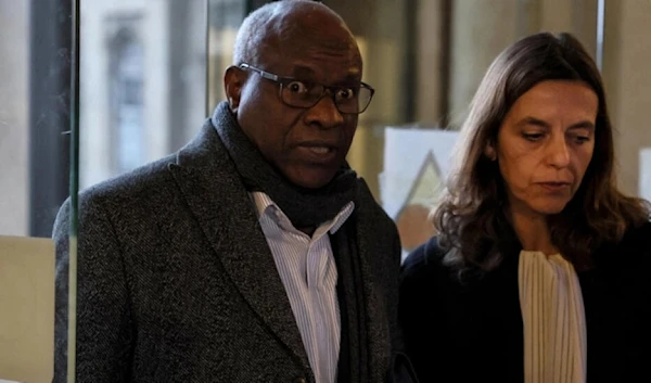 Sosthene Munyemana arrives at court on November 14, 2023 in Paris. (AFP)