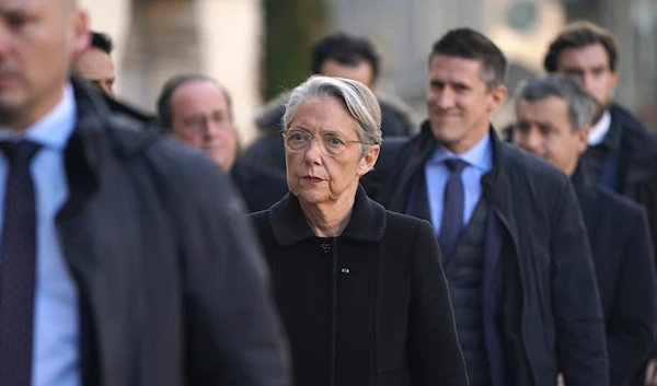 French Prime Minister Elisabeth Borne arrives to the funeral ceremony for former Lyon mayor Gerard Collomb, Wednesday, Nov. 29, 2023 at the Saint-Jean cathedral in Lyon, central France. (AP)