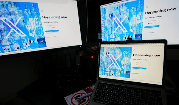 Social media platform X crashes globallyComputer monitors and a laptop display the X, formerly known as Twitter, sign-in page, July 24, 2023, in Belgrade, Serbia (AP)