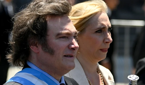 Argentina's newly sworn-in President Javier Milei, left, and his sister Karina arrive to the government house in Buenos Aires, Argentina, Sunday, Dec. 10, 2023. (AP Photo/Julian Bongiovanni)