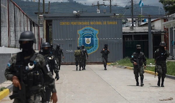 Military police guard the entrance to the National Penitentiary Center in Tamara, on the outskirts of Tegucigalpa, Honduras, Tuesday, June 26, 2023.(AP)