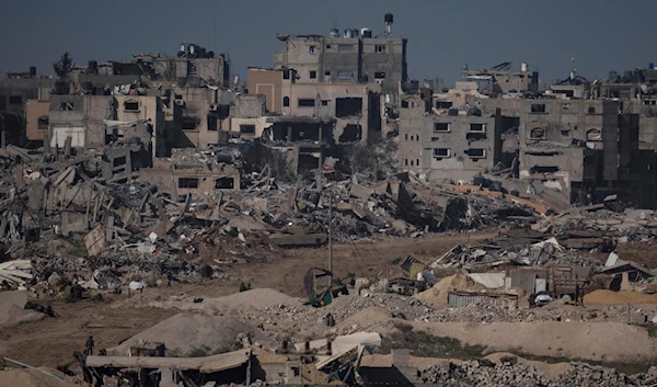 Israeli troops walk in the Gaza Strip on Thursday, Dec. 21, 2023. (AP)