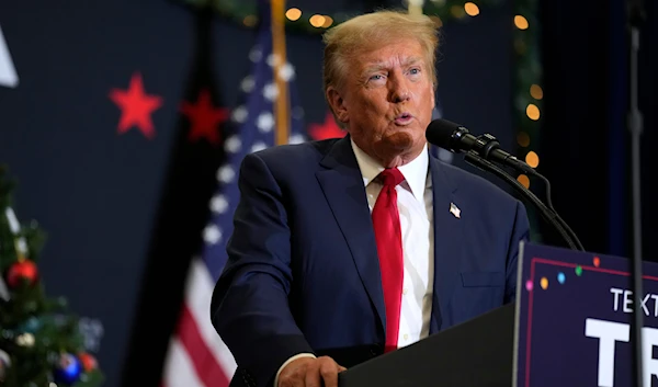 Former President Donald Trump speaks during a commit to caucus rally, Tuesday, Dec. 19, 2023, in Waterloo, Iowa. (AP)