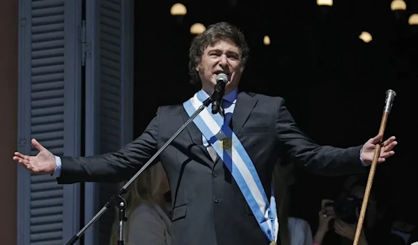 Argentina's President Javier Milei addresses supporters from the Casa Rosada balcony, after his swearing-in ceremony, in Buenos Aires, Argentina December 10, 2023. (AP)