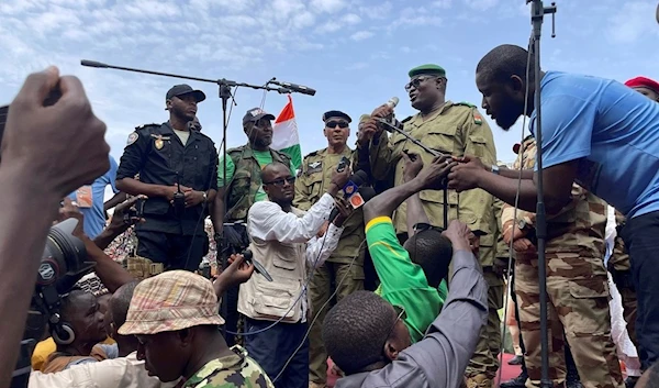 Mohamed Toumba, one of the soldiers who overthrew the Western-backed regime in Niger, addresses supporters  in Niamey, Niger, Sunday, Aug. 6, 2023 (AP)