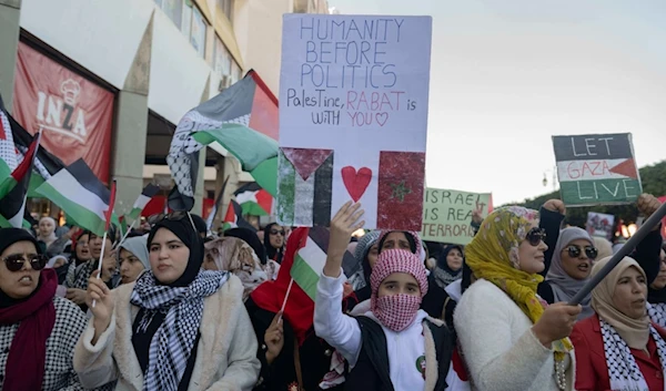 Hundreds of protesters take part in a march in solidarity with Palestinians in Gaza and against their country's normalization deal with Israel, in Rabat, Morocco, Sunday, Dec. 10, 2023. (AP)