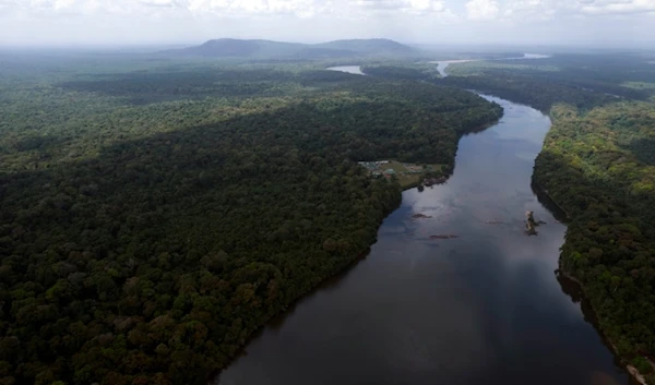 The Essequibo River flows through Kurupukari crossing in Guyana, Nov. 19, 2023. (AP)