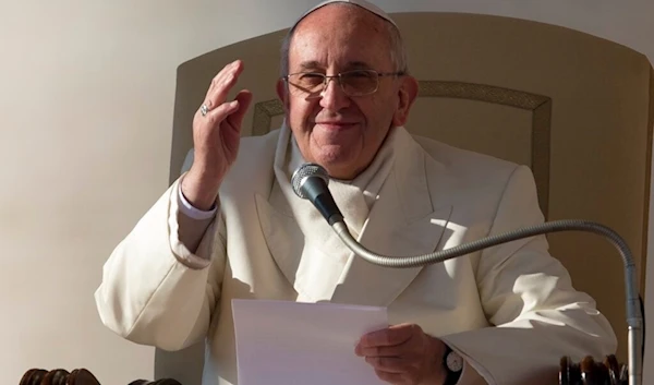 Pope Francis delivers his speech during his weekly general audience in St. Peter's Square at the Vatican, Wednesday, Dec. 11, 2013. (AP)