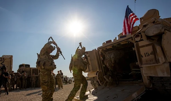 US occupation forces enter Bradley fighting vehicles at a US military bases in Northeastern Syria, on Nov. 11, 2019. (AP)