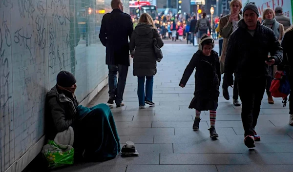 A homeless man in London. Some London councils have resettled people miles away, undated. (AFP)