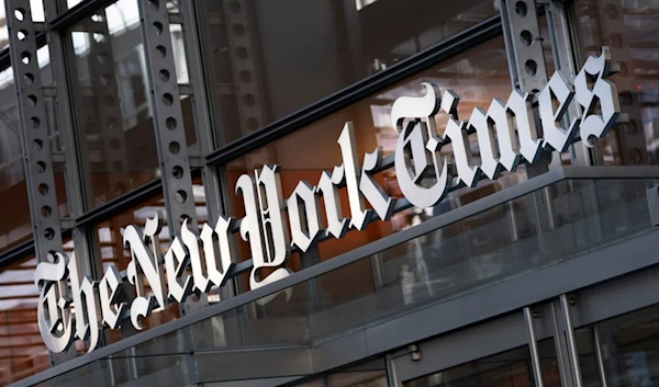 A sign for The New York Times hangs above the entrance to its building, Thursday, May 6, 2021 in New York. (AP)