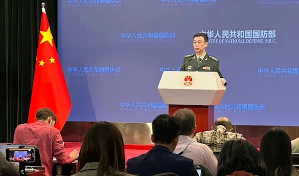 China's Defense Ministry spokesperson Col. Wu Qian speaks to reporters at a monthly briefing in Beijing, Thursday, Dec. 28, 2023. (AP)